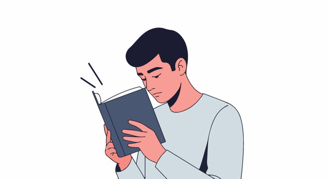 A young man with dark hair absorbed in reading a blue book