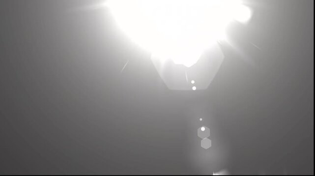 optical light ray loop animation on black screen. Sun rays view, sun spotlight glowing burst concept. optical light beams on black background. 