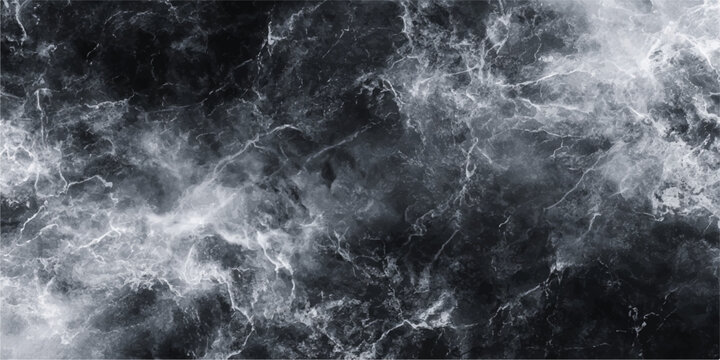A dark and stormy black and white sky filled with heavy clouds and a smoke texture over a dramatic ocean wave
