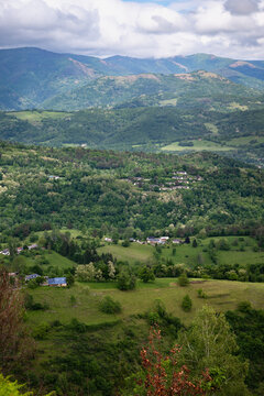 Landscape with green mountains and cloudy sky. Ariege Pyrenees France