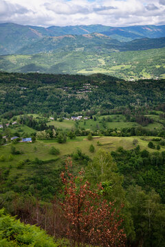 Landscape with green mountains and cloudy sky. Ariege Pyrenees France