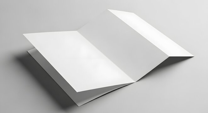 Blank white brochure or booklet mockup with folded pages on gray background ideal for design and marketing presentations with copy space