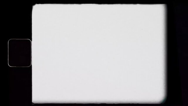 Authentic 8mm film frame overlay with sprocket holes, dust, scratches, and grunge texture on a black background.