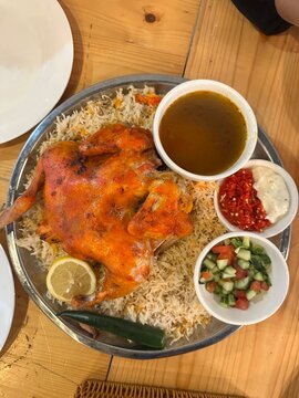 Arabic Chicken Mandy Rice Platter with Side Dishes