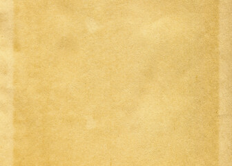 Fototapeta premium Retro photo paper texture. Vintage stained paper background with copy space. Aged and yellowed dirty paper.