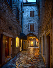 Obraz premium Evening view of the street of the old city. Kotor, Montenegro. The Bay of Kotor is the beautiful place on the Adriatic Sea. Kotor, Montenegro.
