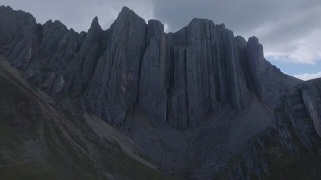 Aerial lateral tracking shot of Castillo de Vichaycocha in the high Andes of Lima, Peru