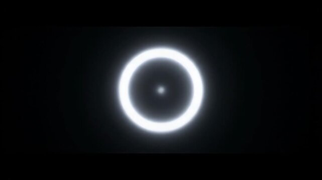 Abstract animation of a glowing white circle collapsing into a single point of light. Futuristic energy ring implosion or portal closing effect on a dark background