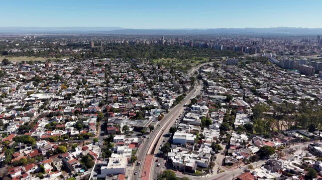 High angle view of Cordoba city, Argentina, featuring streets, park, and buildings.