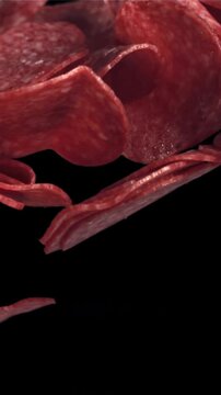 Sliced salami flies up and falls down. Filmed on a high-speed camera at 1000 fps. High quality FullHD footage
