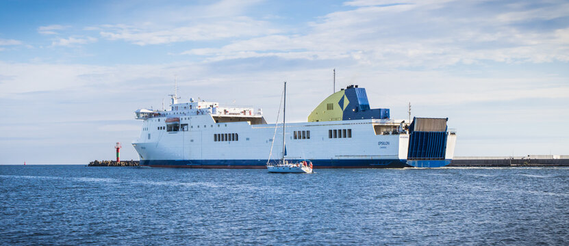 Swinoujscie, West Pomeranian - Poland - July 06, 2024: Unity Line Epsilon ferry leaving port in Swinoujscie and sailing to Trelleborg. Transport passengers and cars