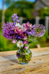 Wild flowers in the garden © Nadiyka
