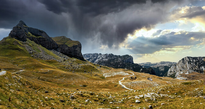 Sedlo Pass on Mount Durmitor in Montenegro with a mountain peak shaped like a horse saddle
