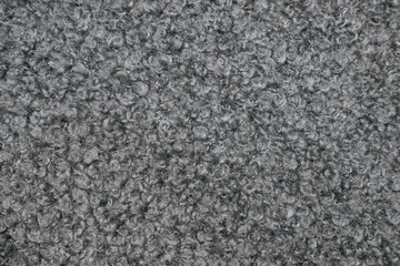 Close Up of Gray Boucle Fabric Texture Background © Elninho