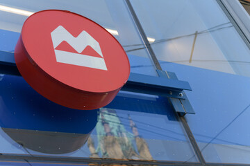 Fototapeta premium corporate logo of BMO Bank of Montreal outside branch at 101 King St E, Toronto