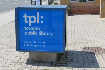 Naklejka premium roadside cube sign outside Toronto Public Library - Taylor Memorial Branch, 1440 Kingston Rd