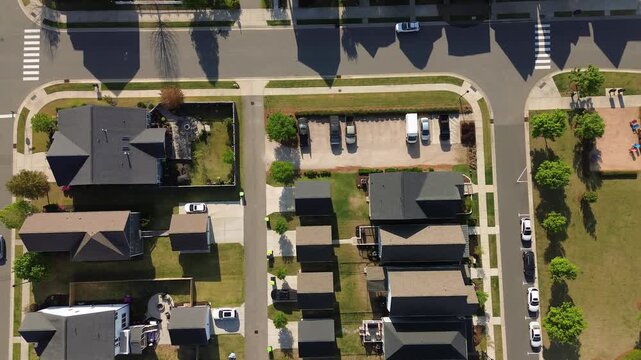 Aerial flyover shot of new Wendell Falls housing development in Wendell, North Carolina, near Raleigh