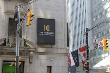 Naklejka premium sign on east wall of One King West Hotel & Residence, at Yonge St, Toronto