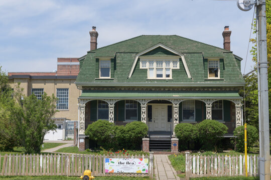 facade of Ashbridge House, or Jesse Ashbridge House, built c1854, with later additions, located at 1444 Queen St E, Toronto