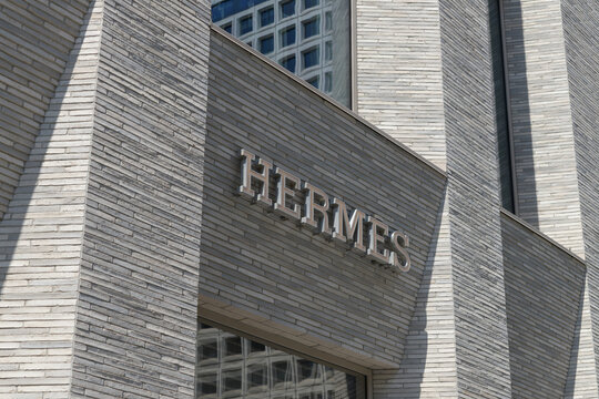 exterior building and sign of Herm&egrave;s, a luxury fashion accessories store, located at 100 Bloor St W, in 10 Bellair Condominium, Toronto