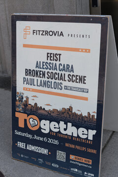 A-frame sidewalk sign featuring concert promotion by Fitzrovia for TOgether for Toronto Healthcare fundraiser