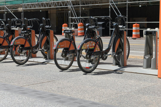 Bike Share Toronto station with rental vehicles on King St W in the Financial District