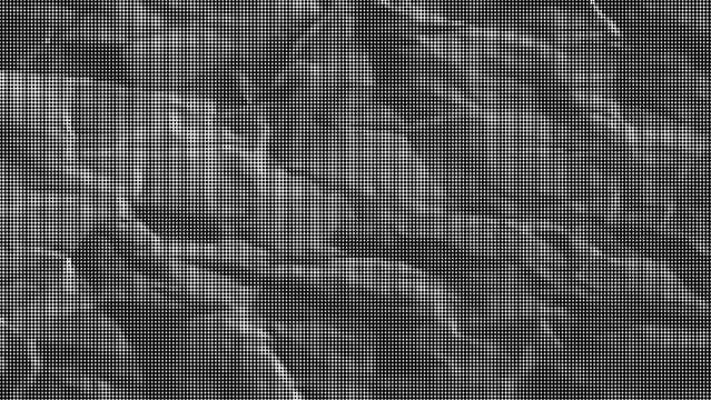 A close-up view of a wrinkled surface with a grid pattern on a textured object.