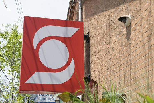 wall-mounted corporate logo sign outside Scotiabank bank branch located at 1016 Kingston Rd, Toronto