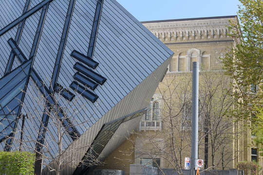 contrast of contemporary The Michael Lee-Chin Crystal designed by Daniel Libeskind and historic original building of the Royal Ontario Museum (Darling & Pearson, 1914), Bloor W, Toronto 