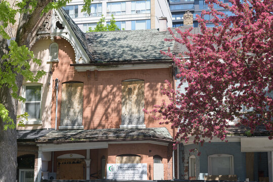 old house at 143 Portland St, slated for redevelopment as  The Addison Residences, Toronto