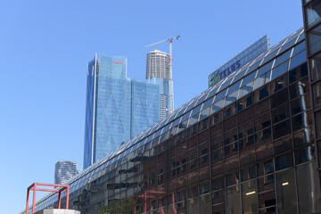Naklejka premium looking southeast on Station St outside SkyWalk from Simcoe St to CIBC Square and SkyTower under construction, Toronto
