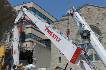 Naklejka premium McLaughlin Planetarium dome actively being smashed to rubble by Priestly heavy machinery, located at 90 Queen's Park, Toronto