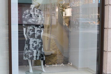 Naklejka premium display window of Shan, a clothing store, located at 38 Avenue Rd, inside Alixandre, featuring Spring/Summer 2026 Coll of Jacquard Printed Top and Printed Midi Skirt (Color 951 ELENA), Toronto