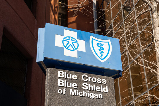 Detroit, Michigan, USA - December 26, 2021: A closeup of  Blue Cross Blue Shield of Michigan logo and sign is shown. Detroit, Michigan, USA. 