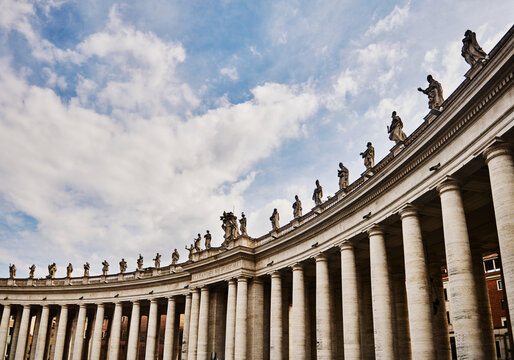 The colonnades of St. Peter's Square (17th century), designed by Gian Lorenzo Bernin, Vatican City, a prominent landmark in Rome, Italy, Europe 