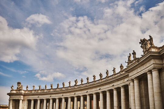The colonnades of St. Peter's Square (17th century), designed by Gian Lorenzo Bernin, Vatican City, a prominent landmark in Rome, Italy, Europe 