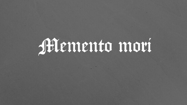 White gothic lettering spells Memento mori across a dark, textured grey background. This ancient Latin phrase serves as a reminder of human mortality, prompting reflection on life and death