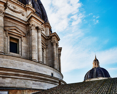 exterior dome and upper architecture of St. Peter's Basilica (4th century) in Vatican City, Rome, Italy, Europe 