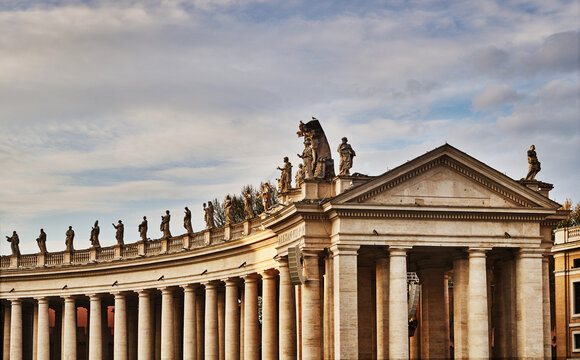 The colonnades of St. Peter's Square (17th century), designed by Gian Lorenzo Bernin, Vatican City, a prominent landmark in Rome, Italy, Europe 