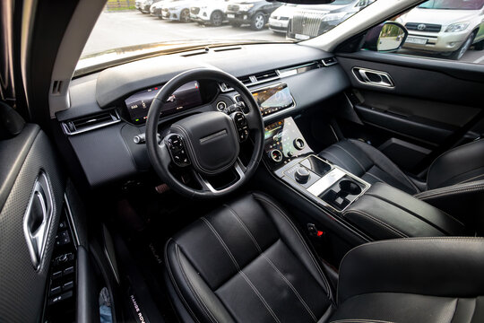 Black Range Rover Velar interior with premium leather, digital dashboard, and modern luxury details. Elegant SUV cabin concept with comfort, technology, and executive lifestyle.