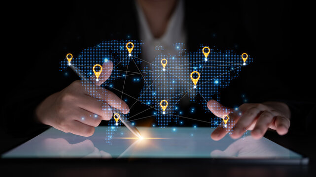 Concept of a global logistics network with location pins on a world map. This represents an international supply chain and distributed business locations for worldwide reach. Fermion