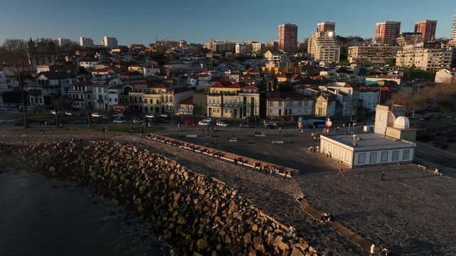 Drone Footage of Foz do Douro Waterfront in Porto Portugal During a Golden Sunset