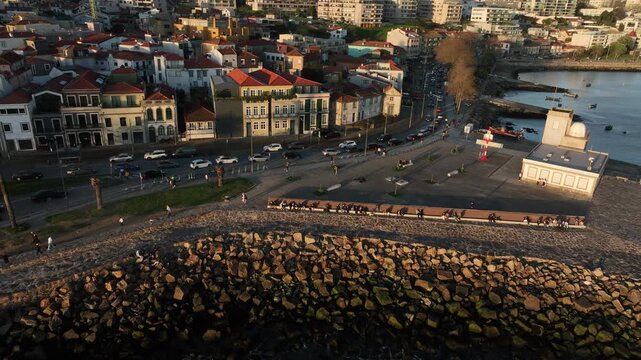 Drone Footage of Foz do Douro Waterfront in Porto Portugal During a Golden Sunset