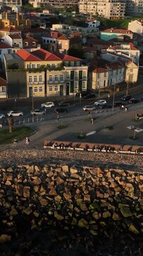 Drone Footage of Foz do Douro Waterfront in Porto Portugal During a Golden Sunset