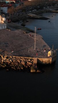 Drone Footage of Foz do Douro Waterfront in Porto Portugal During a Golden Sunset