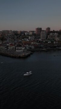 Aerial Cinematic View of Sailing Vessels at Sunset in Foz do Douro Porto Portugal Coast