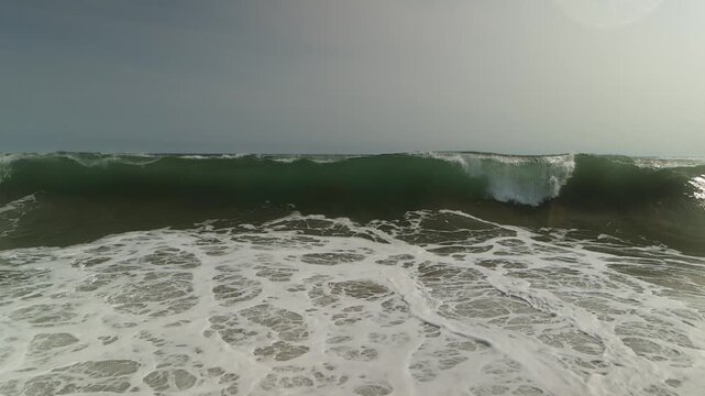 Cinematic Slow Motion Drone Footage of Ocean Wave Formation and Break