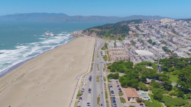 San Francisco Ocean Beach Aerial Pullback View With Great Highway and Coastline