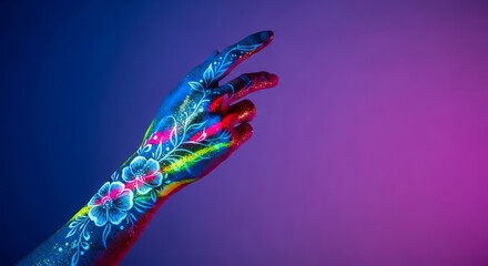 Obraz premium Close up view of a graceful hand decorated with vibrant neon paint splatters, shimmering gold glitter, and delicate floral body art designs, gold, floral, ink
