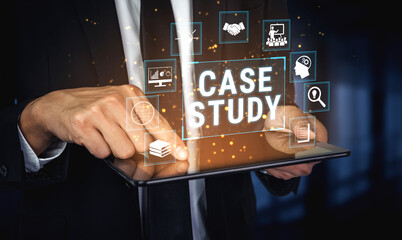 Naklejka na ściany i meble Businessman Using Tablet for Case Study Analysis with Digital Icons Representing Collaboration, Research, and Insightful Data Visualization Fluxor.
